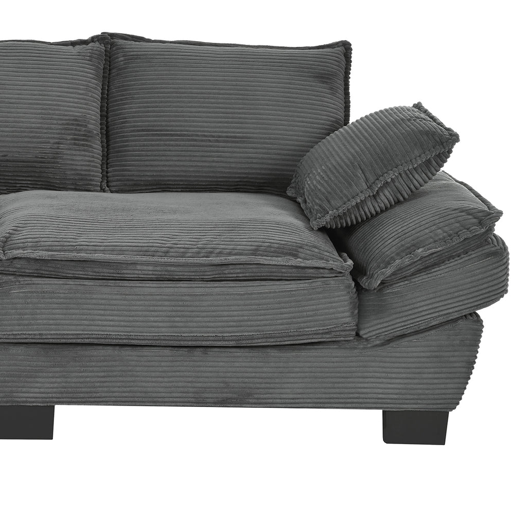 Gray U-shape sofa in bedroom or apartment setting