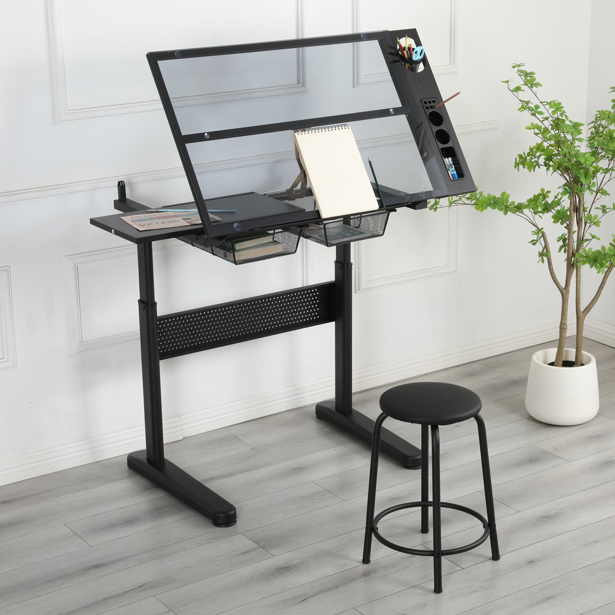Two metal drawers underneath black drafting desk
