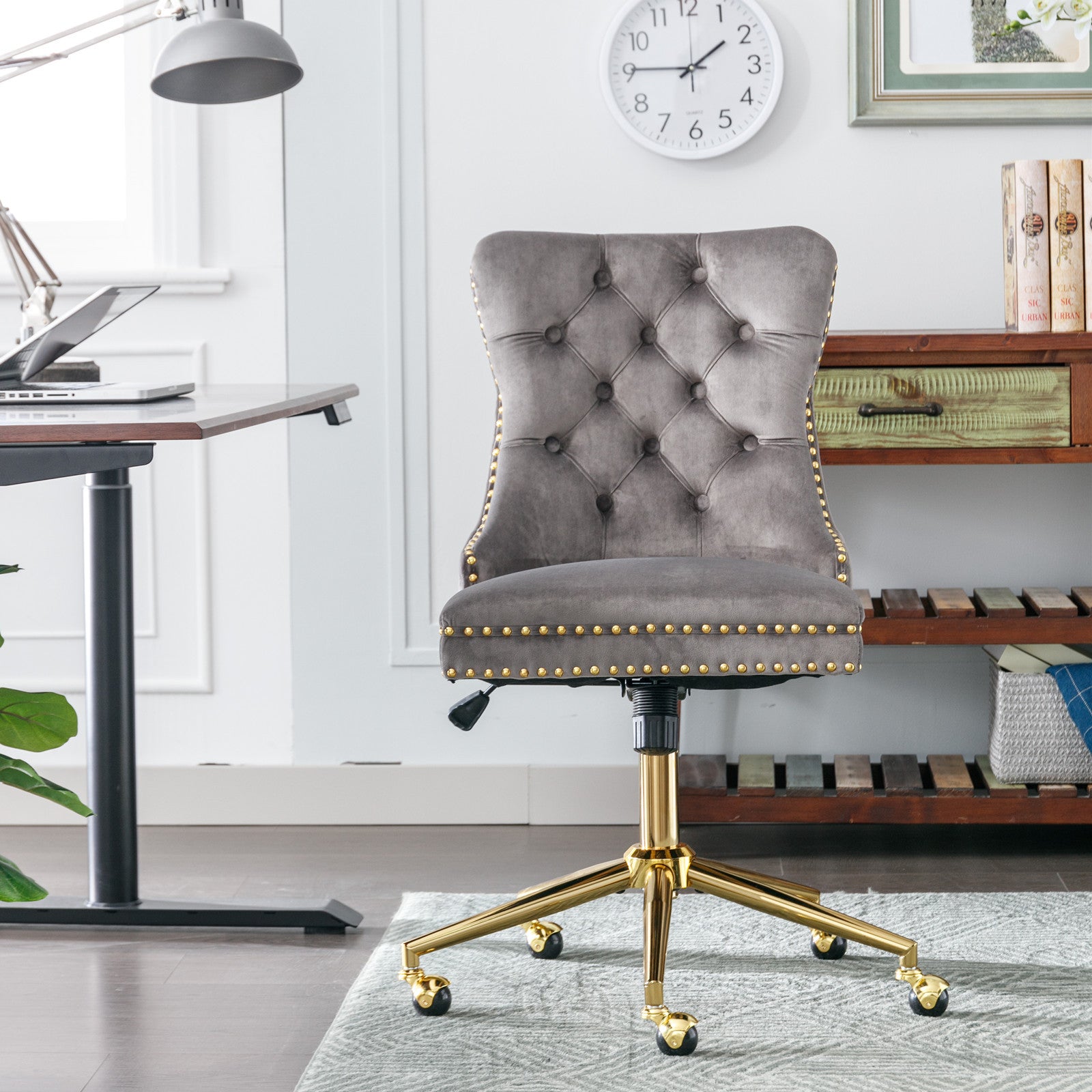 Gray velvet office chair with gold metal base — front view