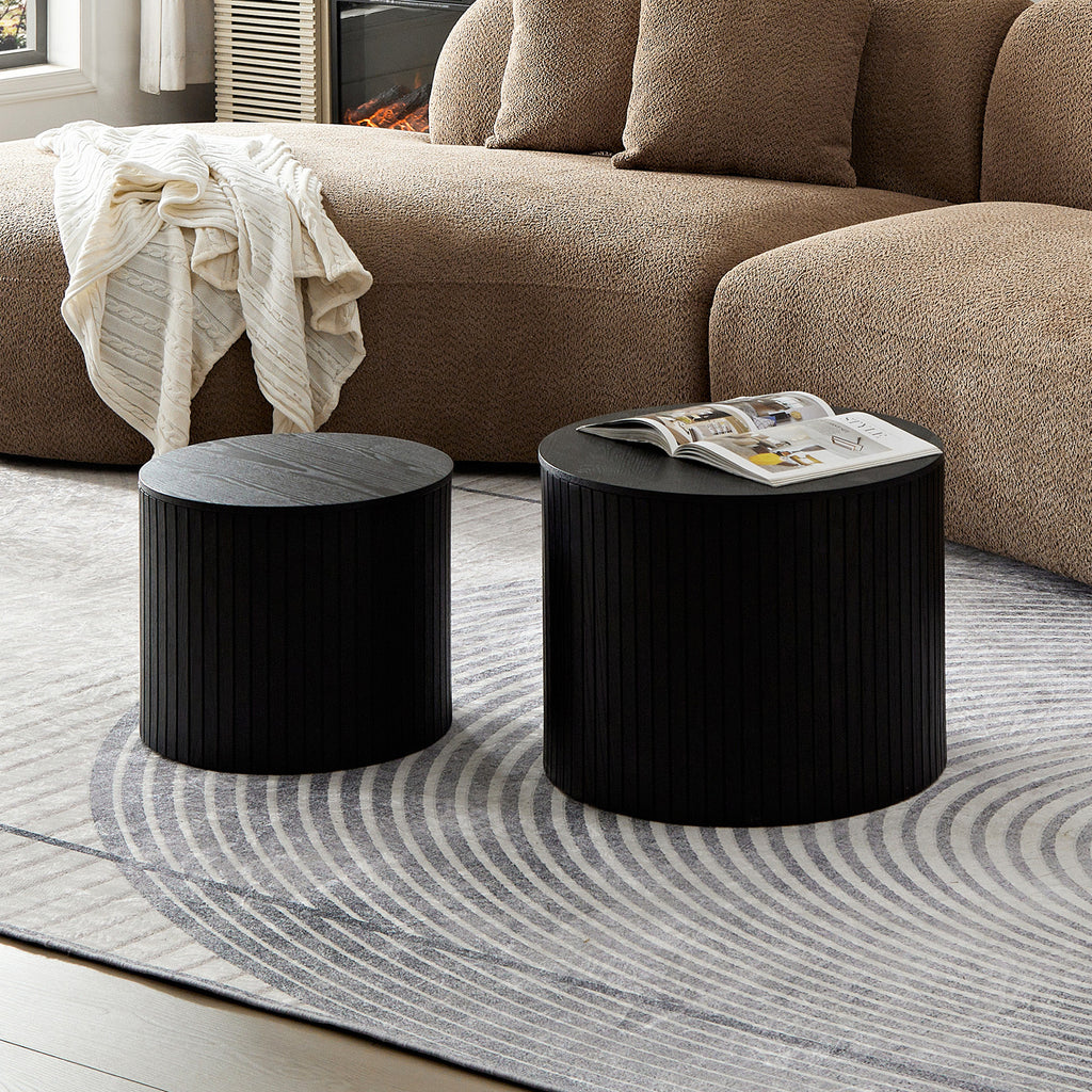 Black round nesting coffee table sofa corner placement