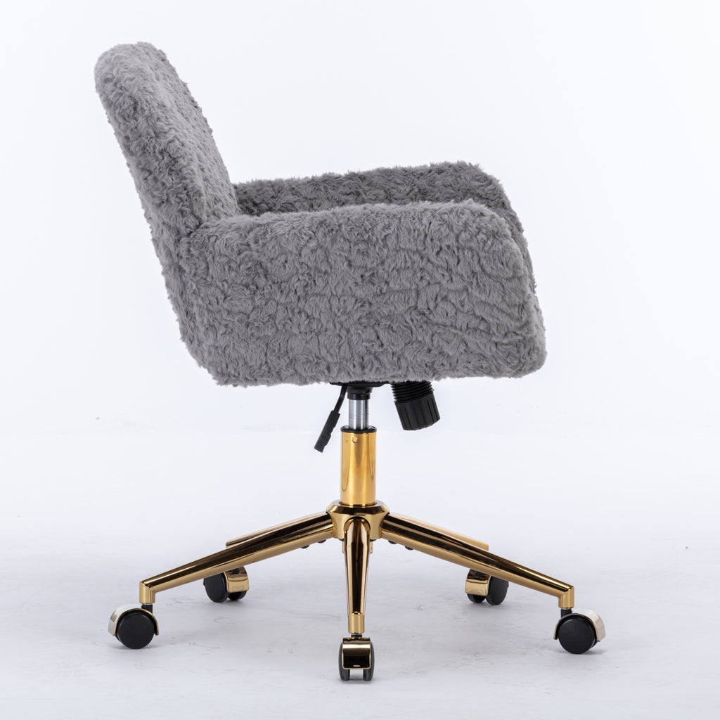 Gold metal base and wheel detail on gray office chair