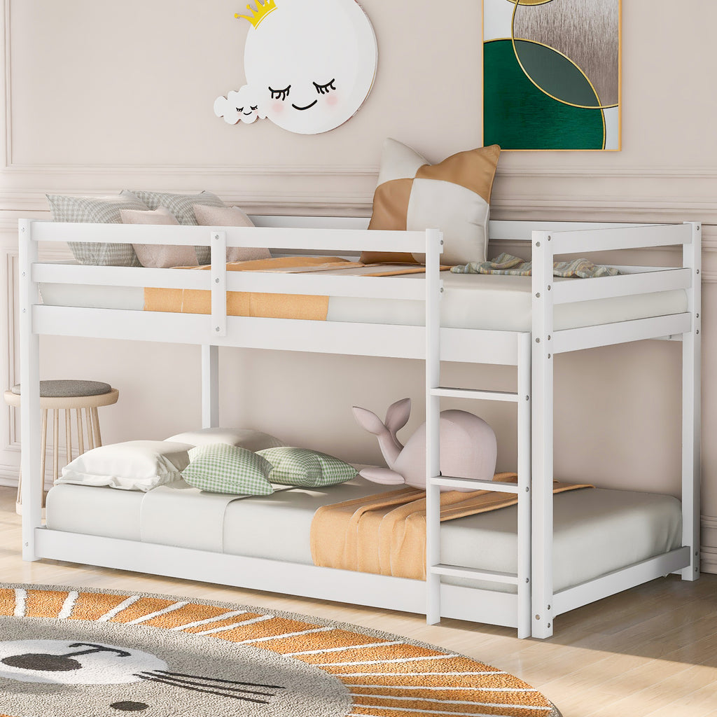 Low-profile twin bunk bed in white finish — angle view