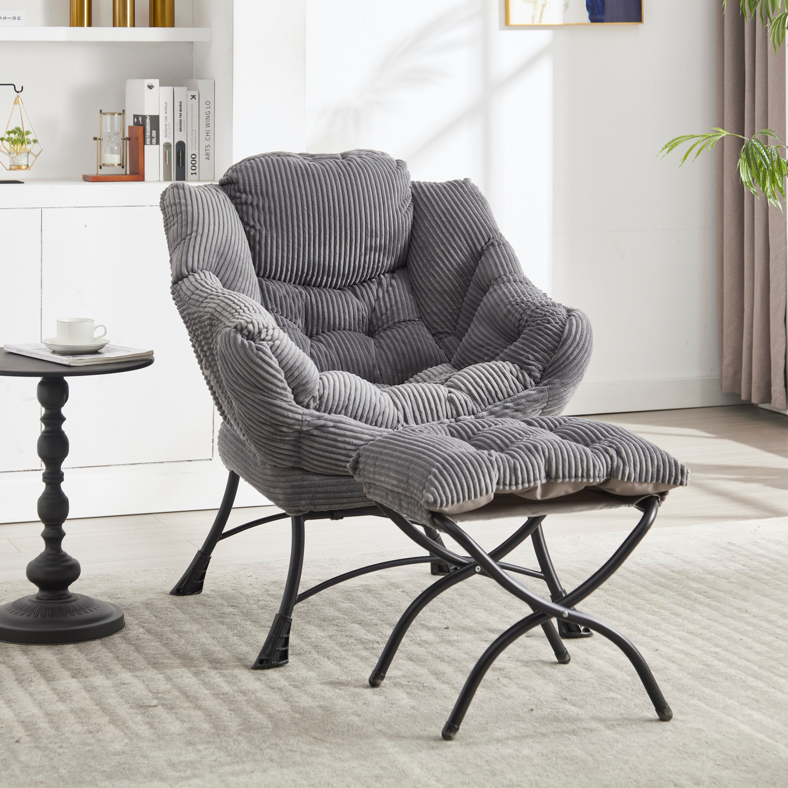 Gray lazy lounge chair with matching ottoman — styled corner