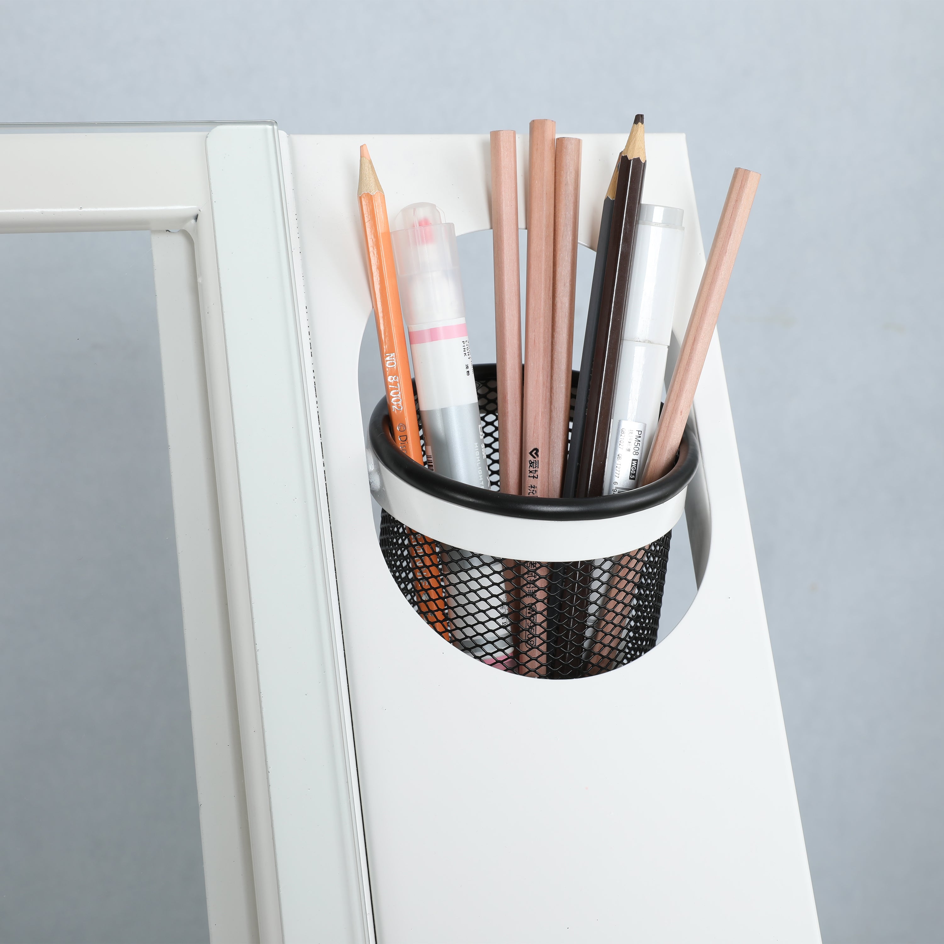 Glass tabletop and metal drawer storage overview
