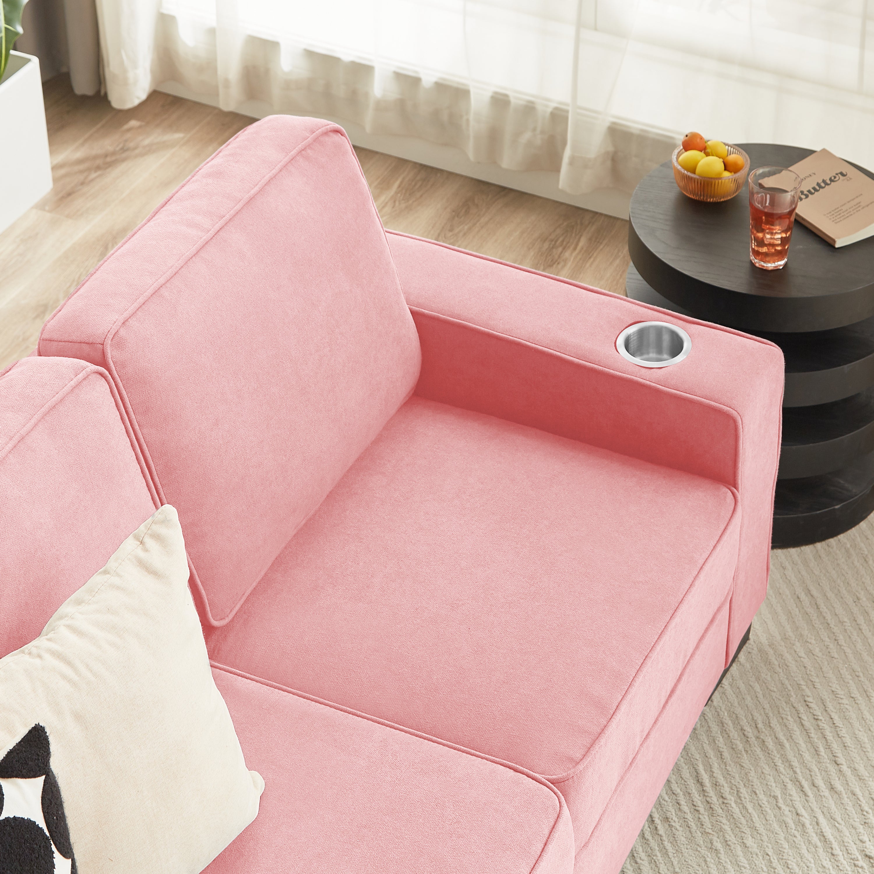Sofa with armrest cup holders detail