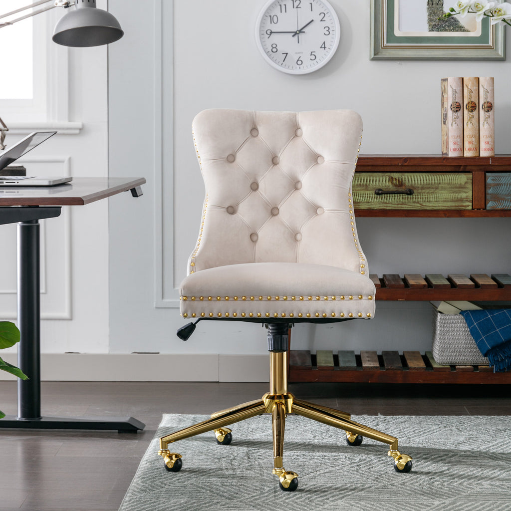 Beige velvet office chair with gold metal base — front view