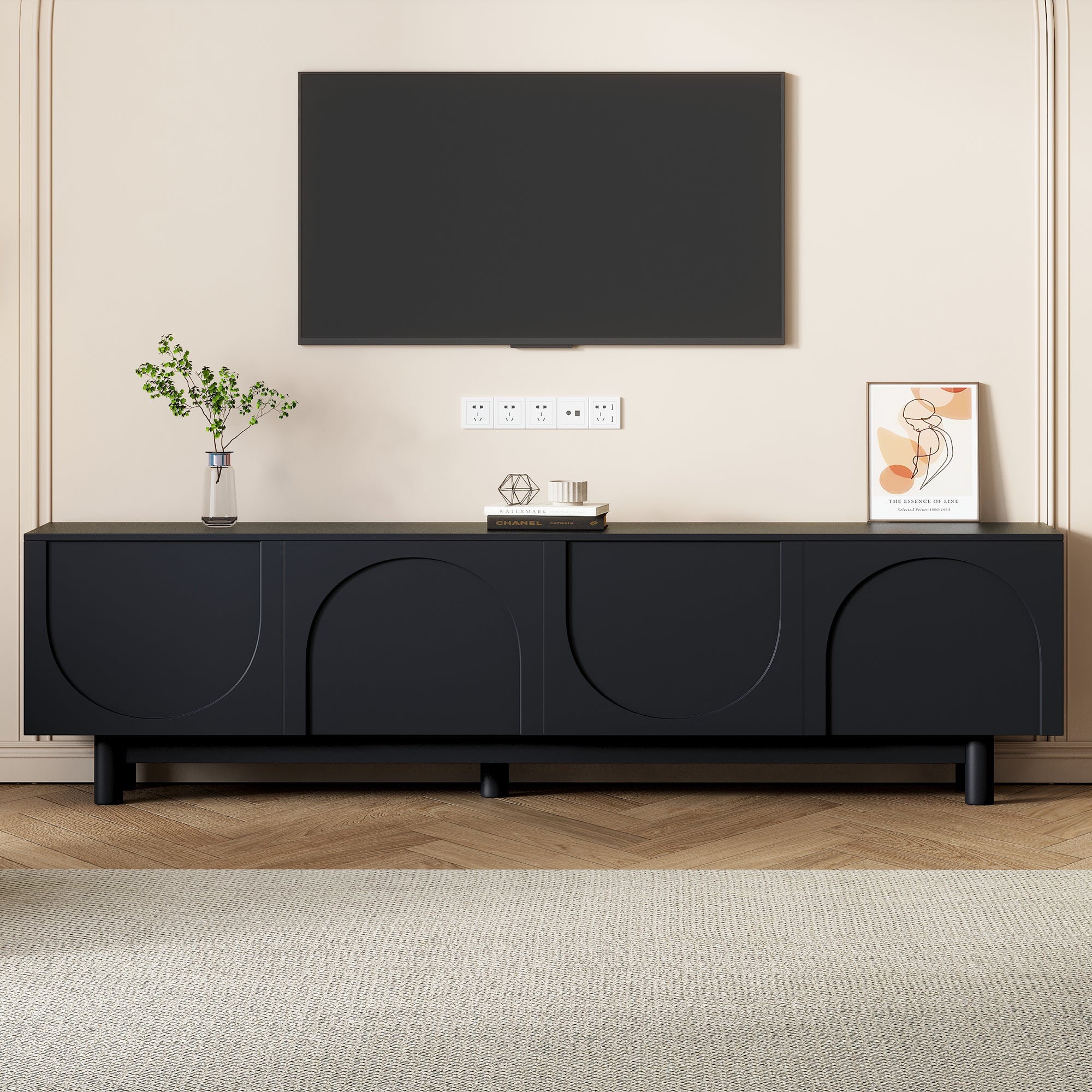 Black media console with arch cabinet doors angle view
