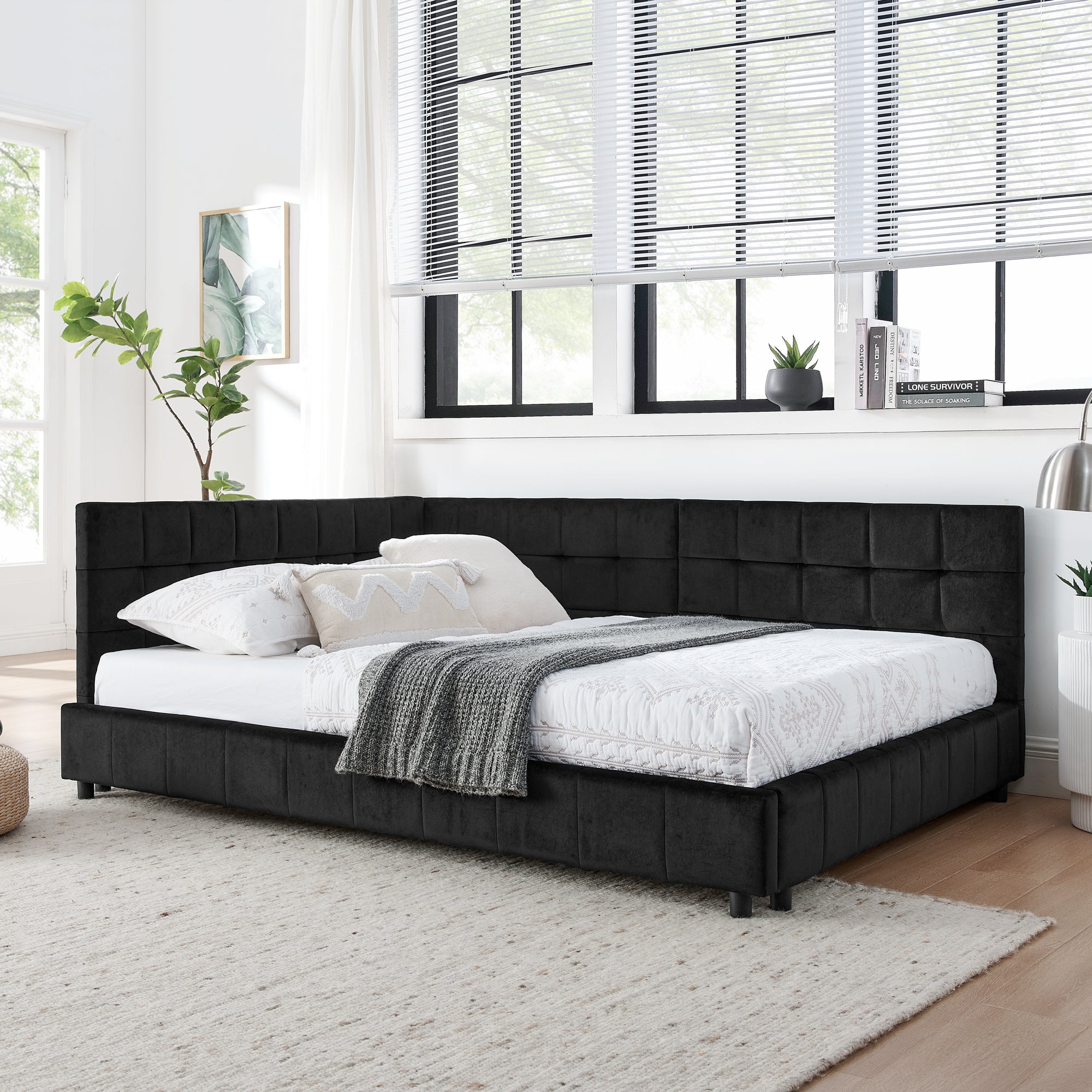 Tufted velvet upholstery close-up — black daybed