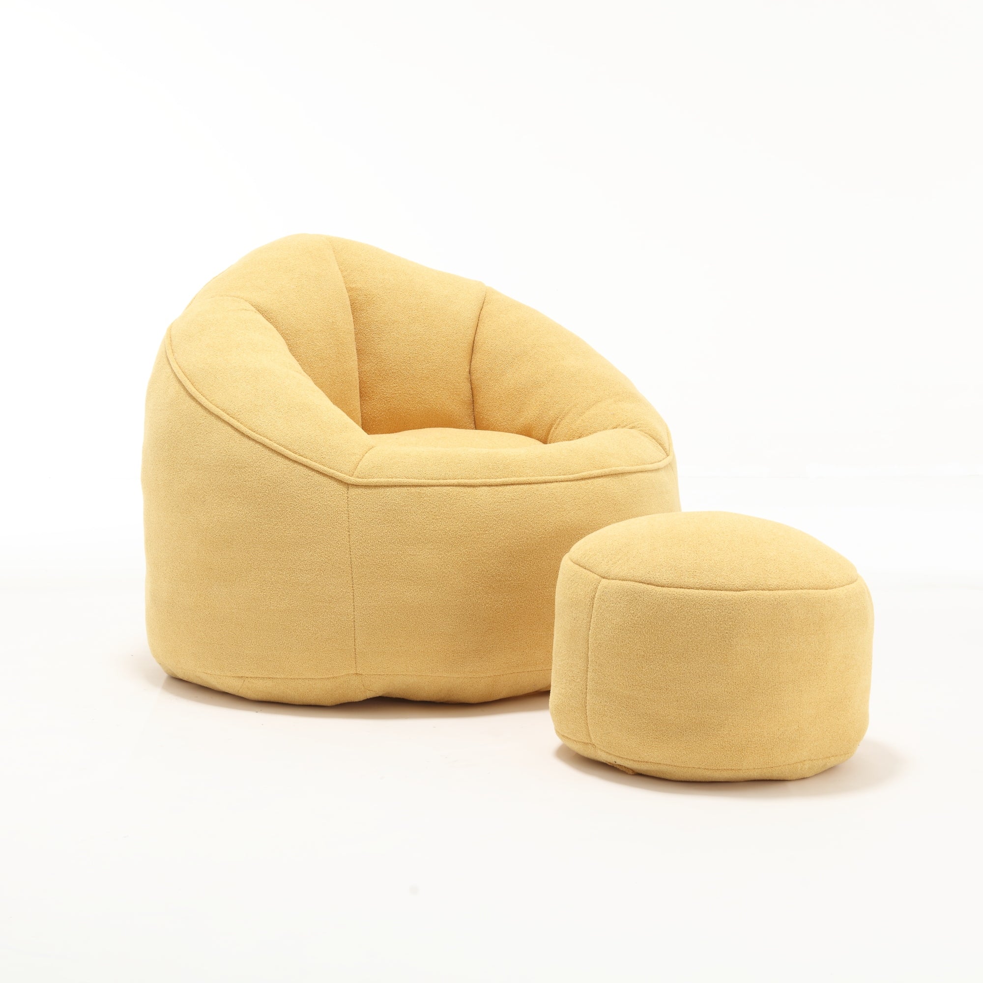 Yellow bean bag chair with footrest — styled bedroom