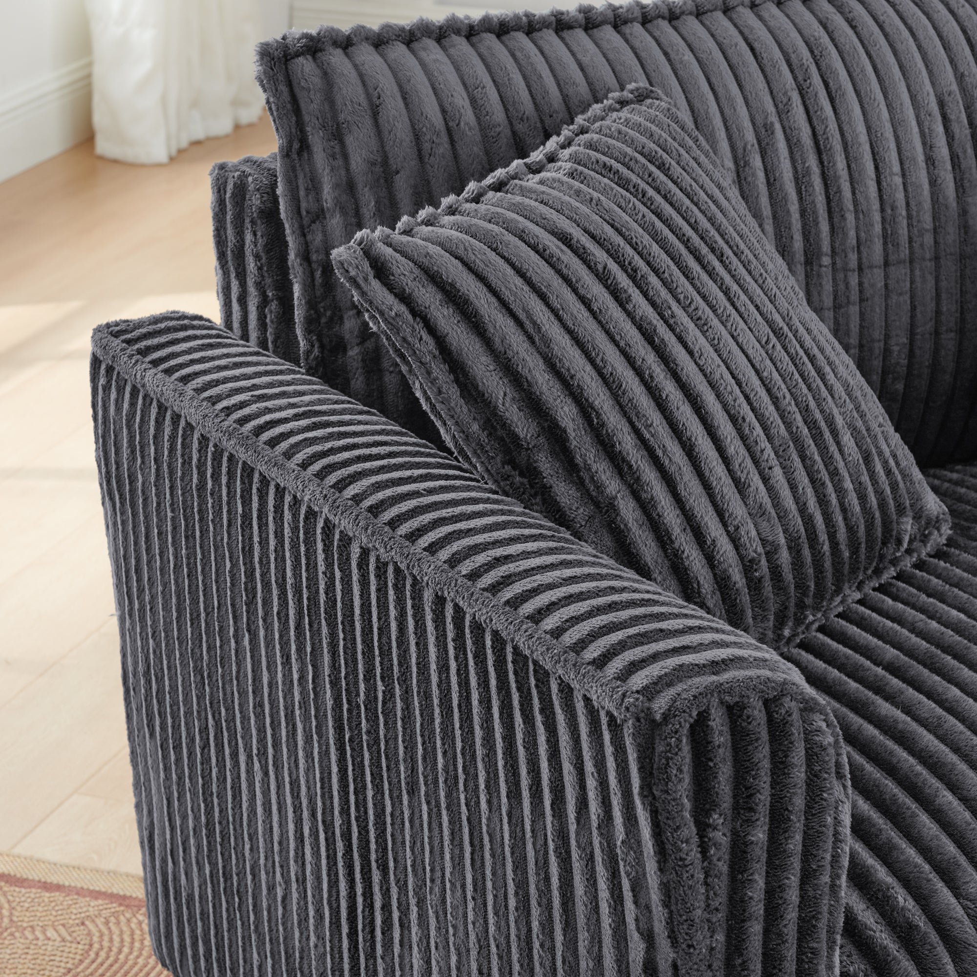 Gray corduroy fabric texture close-up on lazy lounge chair