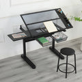 Black hand crank adjustable drafting table with glass top — front view