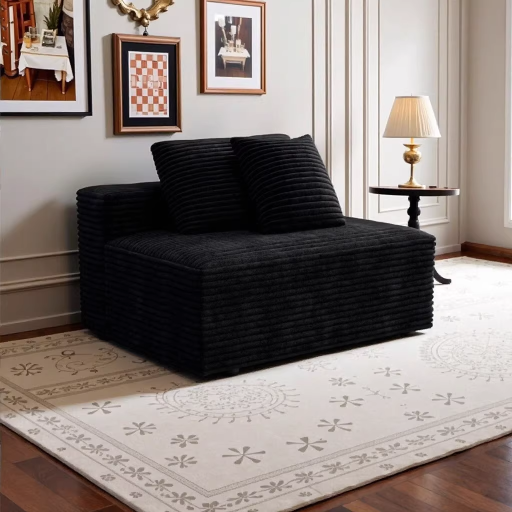Black corduroy modular 2-seat cloud sectional with chaise — front view