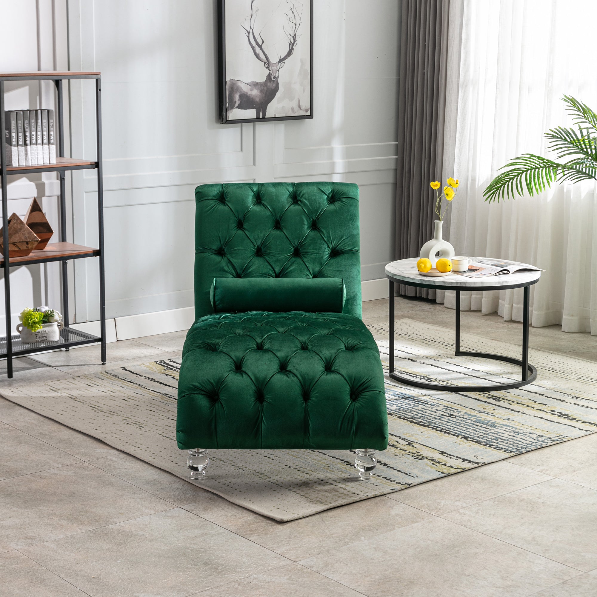 Acrylic leg detail on emerald chaise lounge