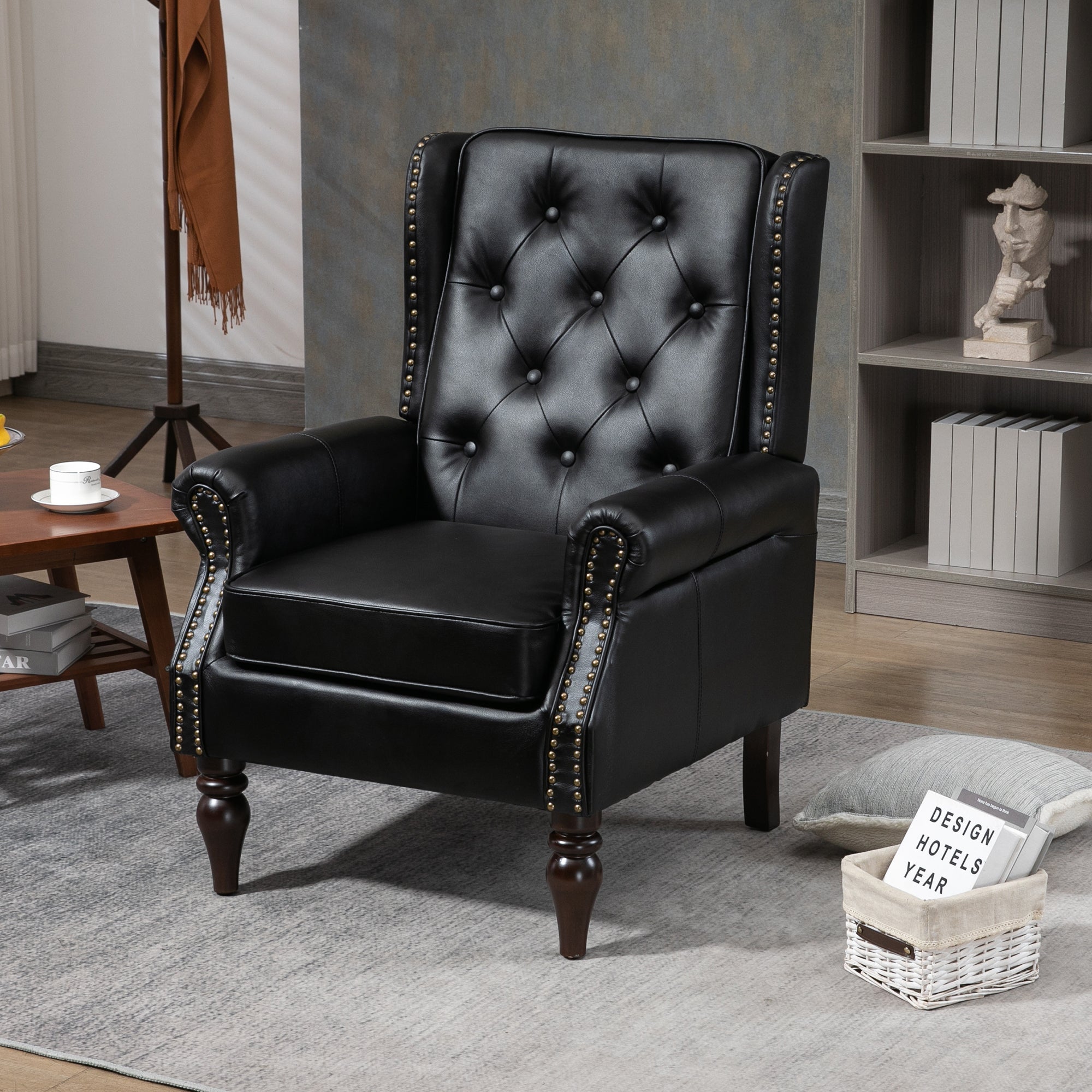 Black accent armchair with wide backrest — angle view