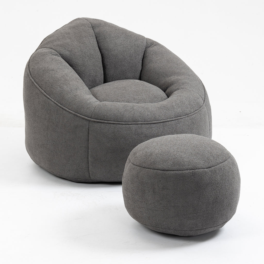 Grey microfiber bean bag sofa chair with footrest — front view