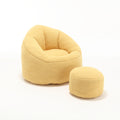 Yellow microfiber bean bag chair with footrest — front view